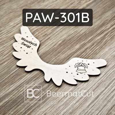 Skrzydło anioła ze sklejki wycinanej laserowo jako ozdoba świąteczna z napisem "Wesołych Świąt" i dzwonkiem.