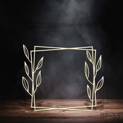 Laser-cut plywood frame with a plant motif for decoration and handicraft projects.