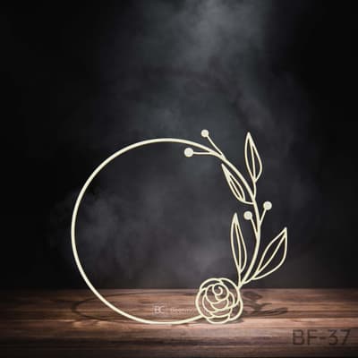 Laser-cut plywood frame with floral motif for decoration and crafts.