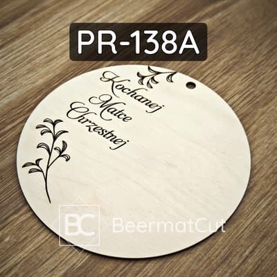 Baza do makramy wycinana laserowo ze sklejki, z grawerem "Kochanej Matce Chrzestnej" i motywem roślinnym.